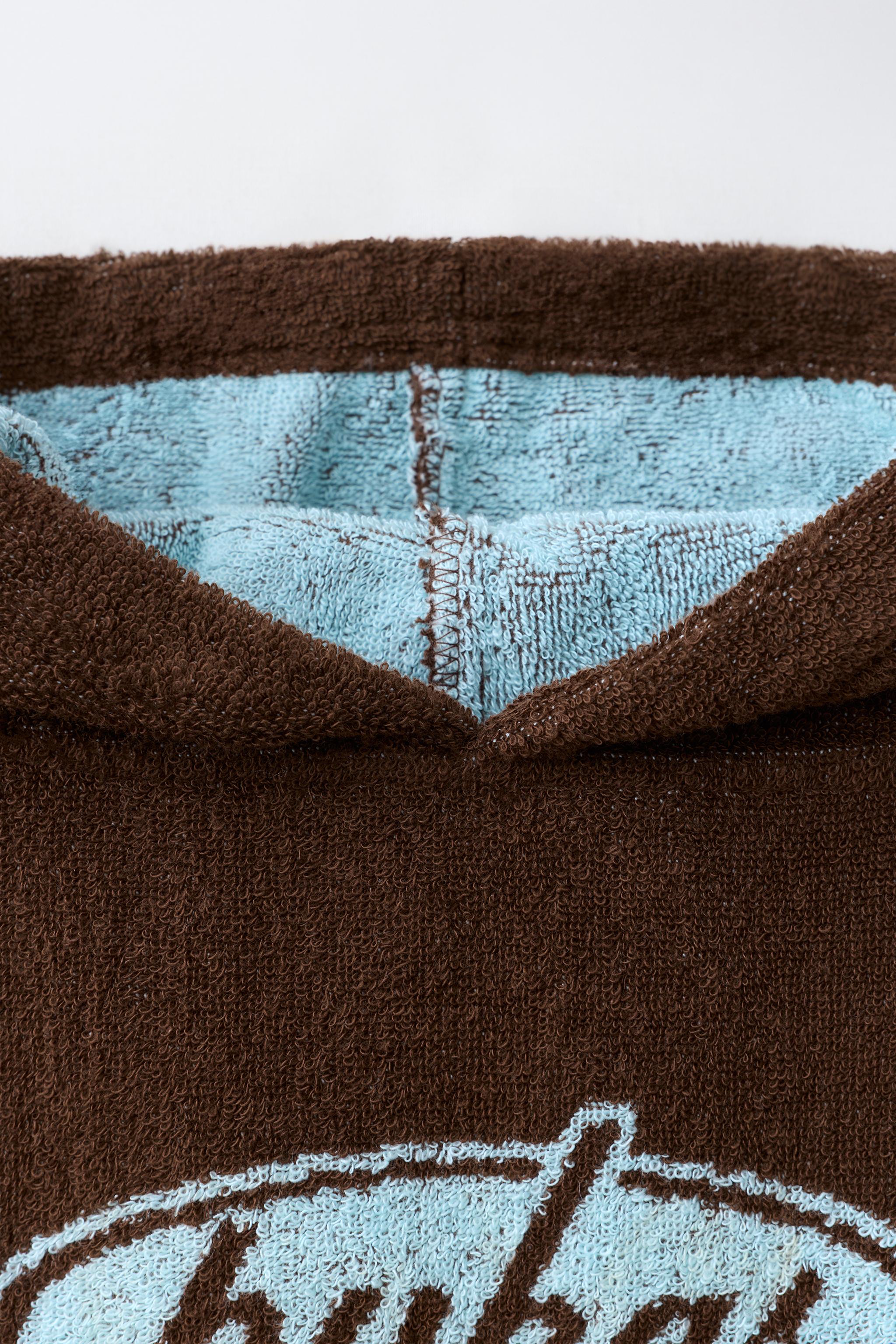 PUKAS SURF TERRYCLOTH PONCHO
